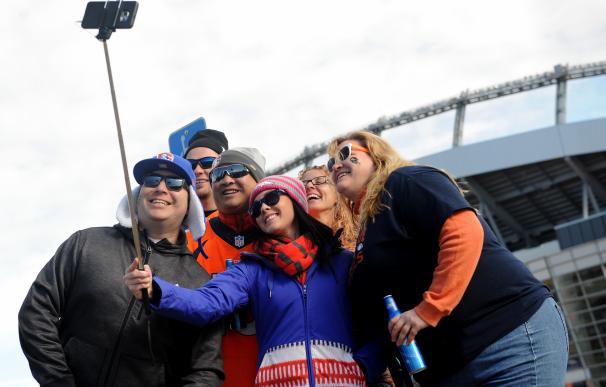 DENVER, CO - JANUARY 24: Fans take a selfie prior