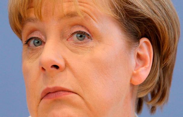 Merkel elogia los esfuerzos reformistas de España para salir de la crisis