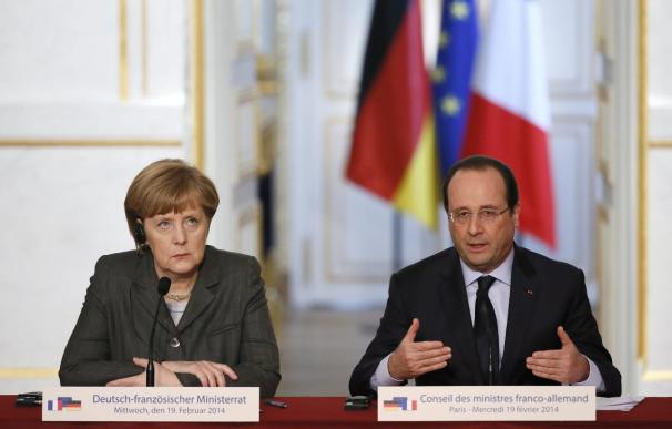 Merkel y Hollande unen sus esfuerzos en la unión bancaria y la tasa a transacciones