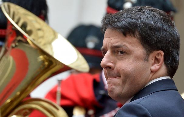 Italian Prime Minister Matteo Renzi waits for Aust