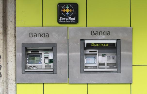 (Ampl.) Bankia ganó 481 millones, un 13,4% menos, por venta de CNB y depreciación de los bonos de la Sareb