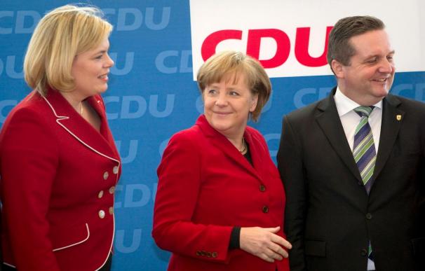 Merkel admite una "dolorosa" derrota que el SPD y los Verdes ven como un voto antinuclear