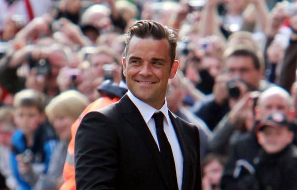 Robbie Williams casi deja la música después de sus últimos fracasos