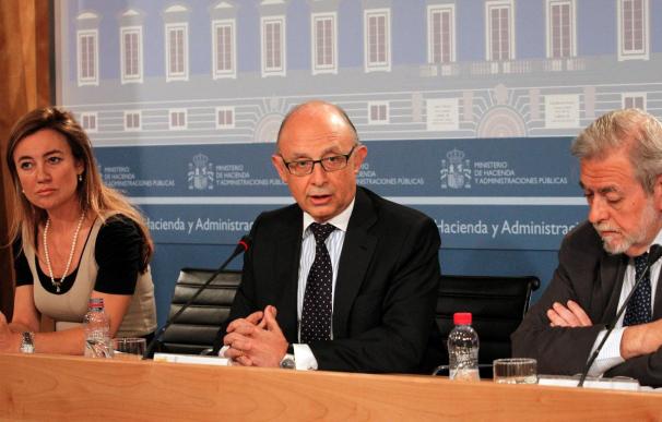El ministro de Hacienda, Cristóbal Montoro, y parte de su equipo en la presentación de los Presupuestos de 2013.