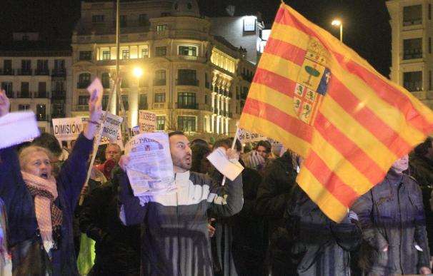 Decenas de personas protestan en la sede del PP tras las palabras de Rajoy
