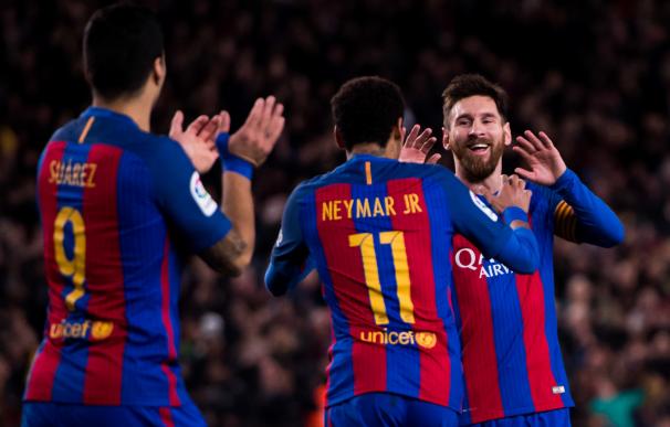 Messi, Neymar y Suárez celebran uno de los goles ante el Celta.