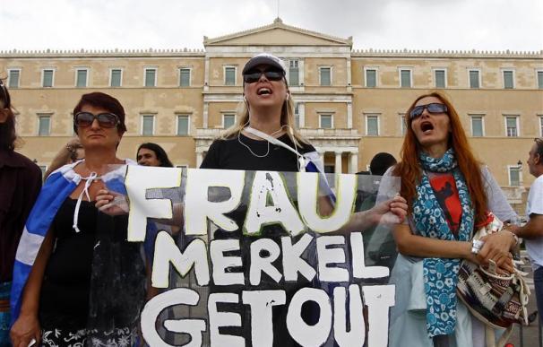 Merkel se enfrentó a las protestas en su visita a Grecia