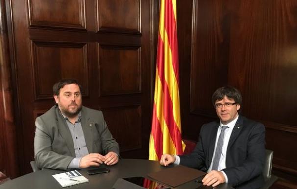Oriol Junqueras y Carles Puigdemont.