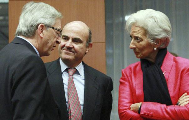 Jean-Claude Juncker, Luis de Guindos y Christine Lagarde.