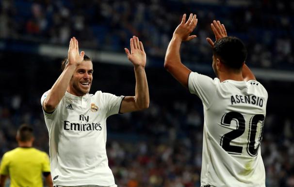 Bale y Asensio celebran el segundo gol del Madrid.