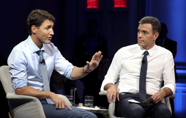 Pedro Sánchez y el primer ministro canadiense, Justin Trudeau, durante un foro en Montreal