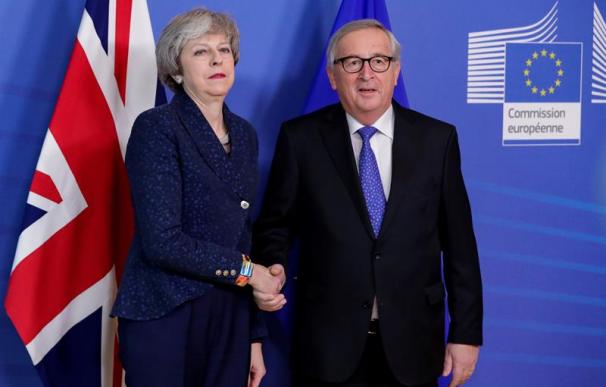May y Juncker, Brexit, Reino Unido, Unión Europea