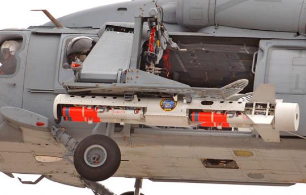 El Airborne Mine Neutralization System preparado en un helicóptero MH-60. /Raytheon