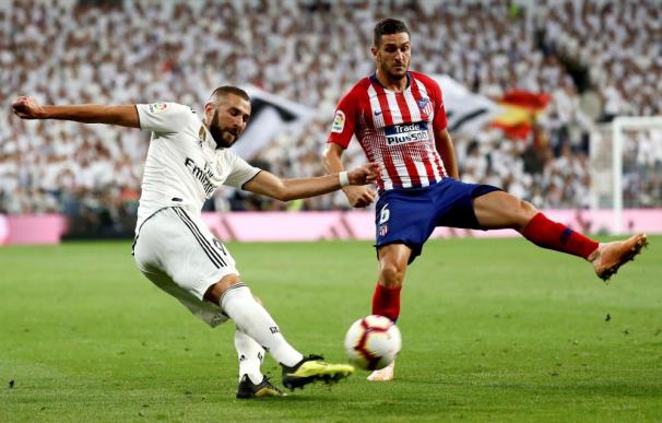 Imagen de un encuentro entre el Real Madrid y el Atlético. / EFE
