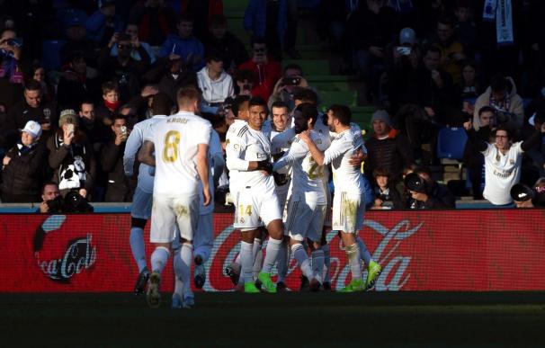 Los jugadores del Real Madrid celebran su segundo gol ante el Getafe. /EFE