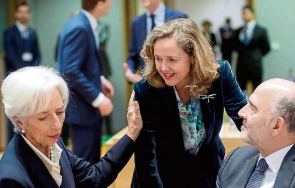 Foto Calviño, Moscovici y Lagarde / EFE-Olivier Hoslet