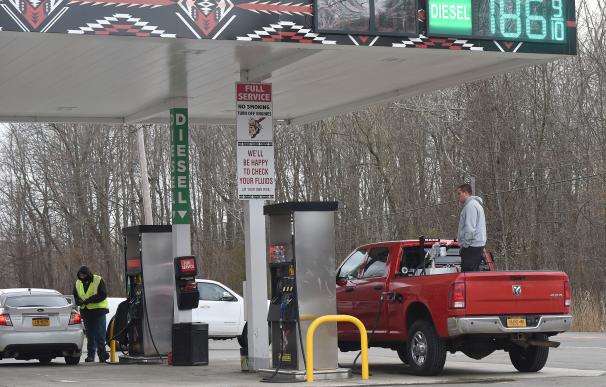 April 21, 2020 - Irving, New York USA: Western New Yorkers fill up their vehicles as well as auxiliary storage containers in Irving, New York just south of Buffalo. As the Covid 19 pandemic takes its toll on the economy so follows the oil market as the pr