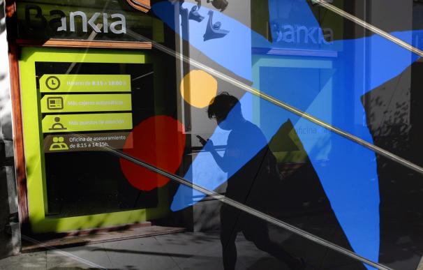 CaixaBank y Bankia afinan el pacto de fusión con 15 grupos de trabajo mixtos