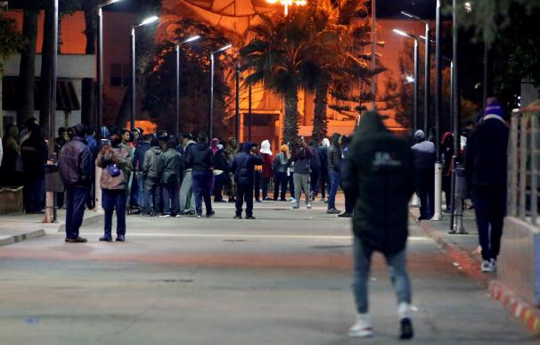 Inmigrantes celebran su entrada en Melilla