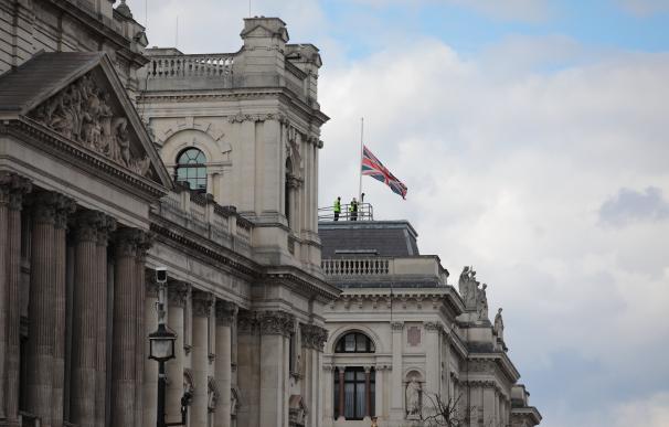 © Licensed to London News Pictures. 09/04/2021. London, UK. The Union Jack above the Foreign, Commonwealth and Development Office is lowered to half mast following the death of Prince Philip.