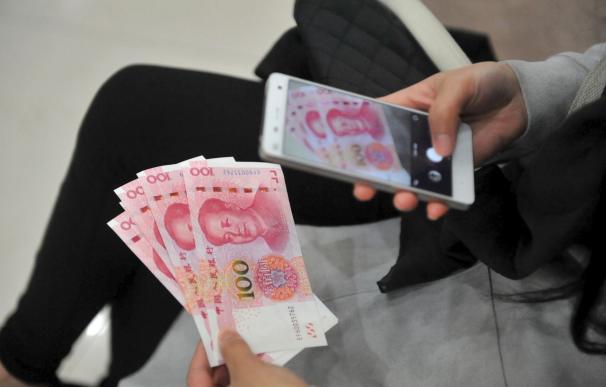 China anuncia una rebaja de los tipos a corto plazo por primera vez en 10 meses