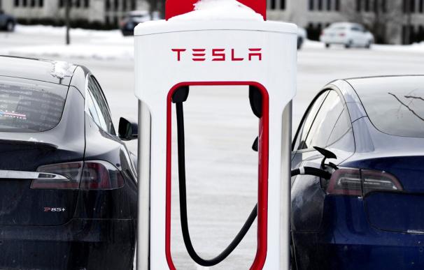 Tesla Supercharger stands in Rolling Meadows, Ill., Monday, Jan. 30, 2023. (AP Photo/Nam Y. Huh)
