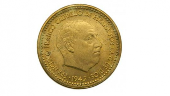 Una moneda de peseta de 1947.